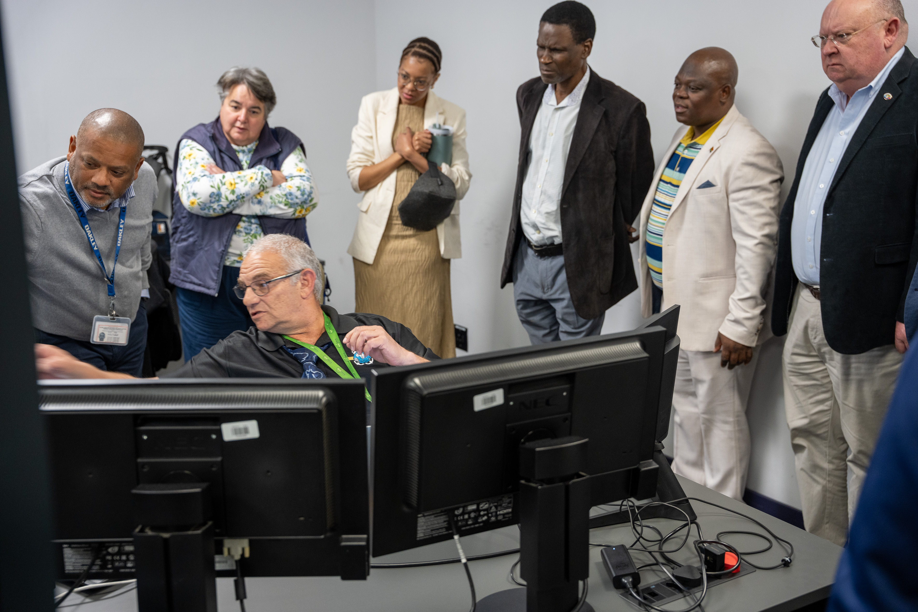 Paul Feldman on duty at the South African Mission Control Cente in Milnerton, Cape Town talks to guests about the COSPAT SARSAT system that he was monitoring at the time. A Global Search and Rescue Day event was held at Cape Town radio to mark the day.  Picture Andrew Ingram / NSRI