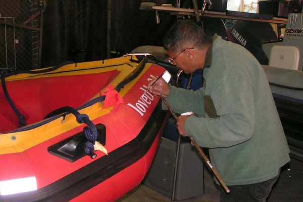 Signwriter hard at work