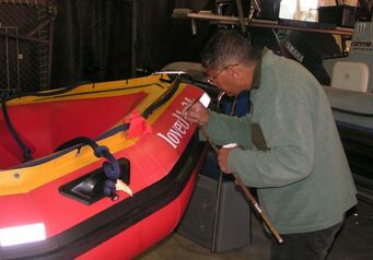 Signwriter hard at work