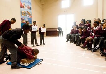 A4 Oct Learners from Sedgefield Primary saying HELLO before they can start with CPR