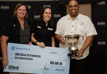 L to R Sue Cartwright and Natasha Macdonald from Centrum with Mario Fredericks from NSRI Strandfontein rescue base for email