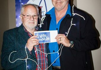 Gordons Bay business forum President Danie Miller Presents NSRI Clive Tesner with a donation Photo Morne Alberts