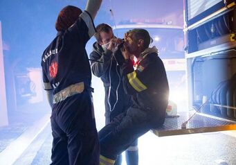 Firefighters receiving assistance