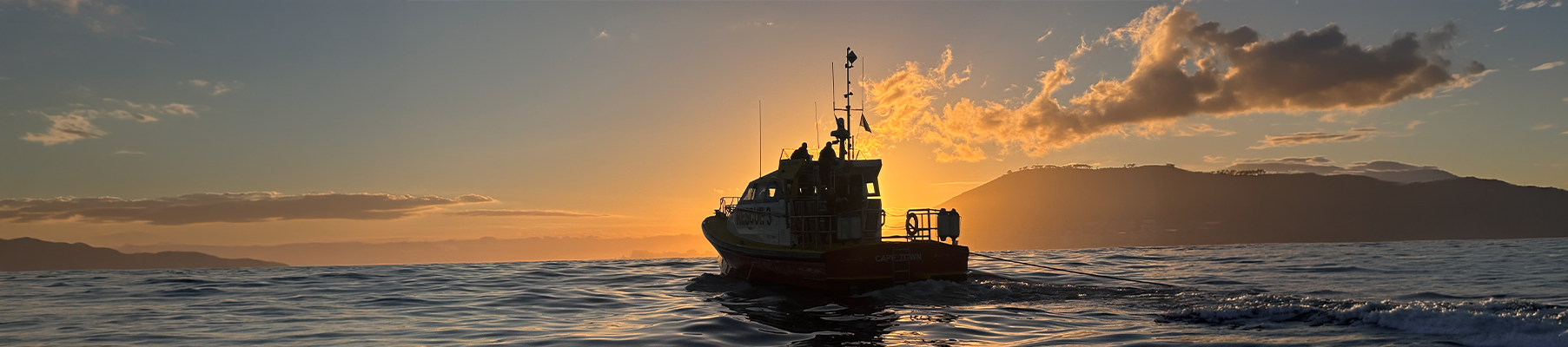 Sea boat sunrise